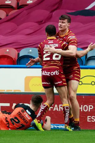 Innes Senior Celebrating With His Teammate After Scoring A Goal Against Castleford