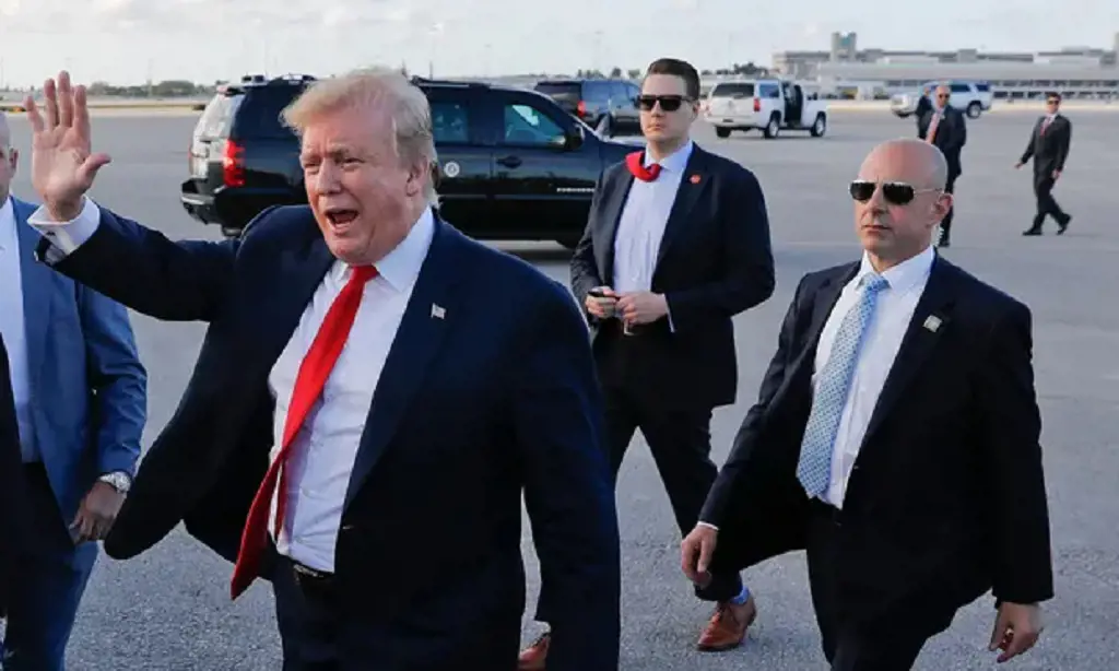 Tony Ornato (right) and other secret service members with President Donald Trump 