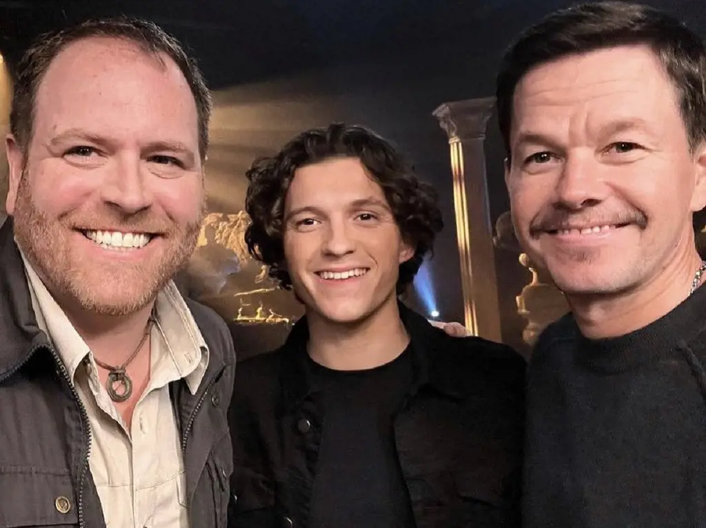 Tom Holland with co-star Mark Wahlberg and television presenter/producer Josh Gates 