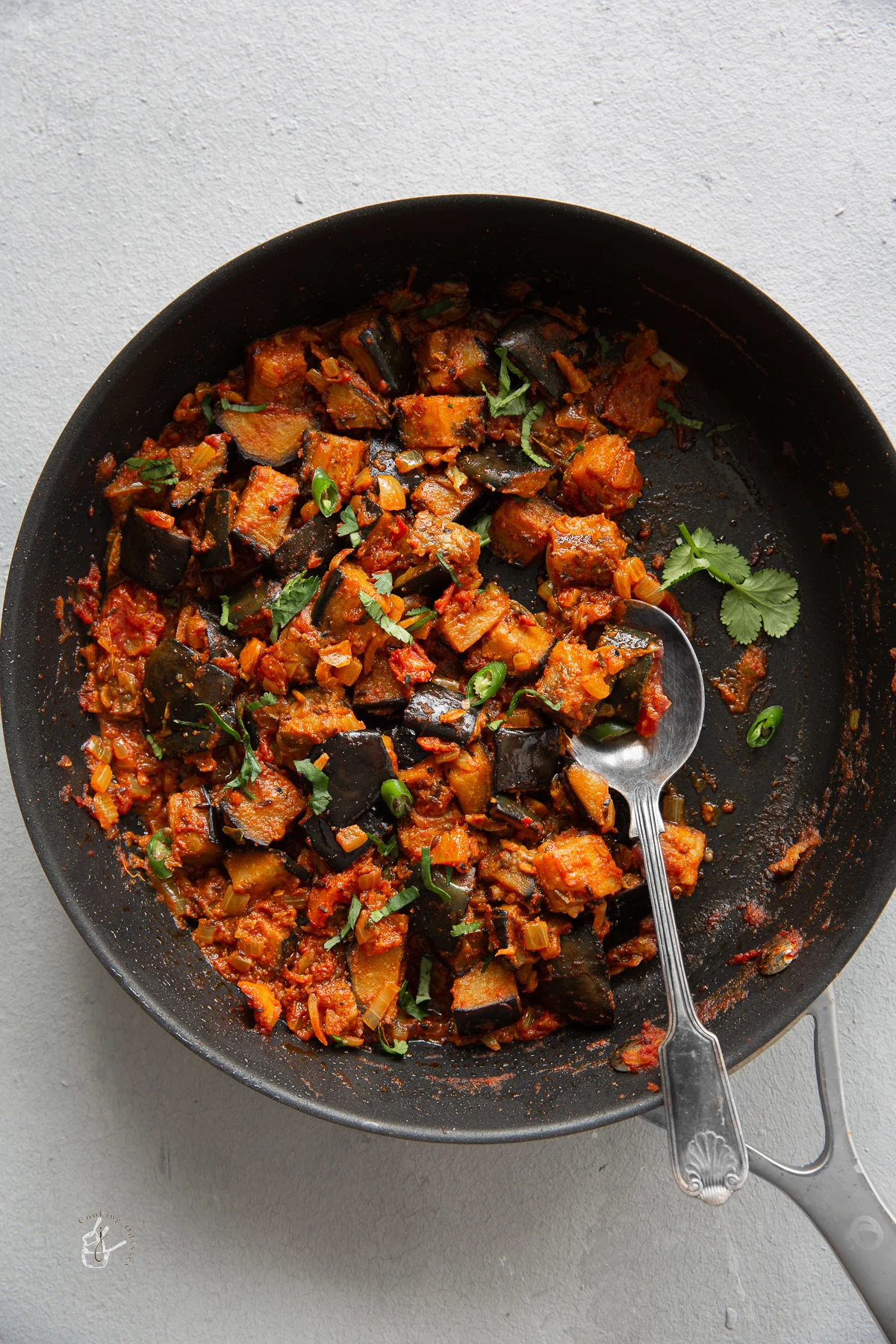 Brinjal bhaji is a quick 20 minute recipe made with aubergine, fresh tomatoes and onions