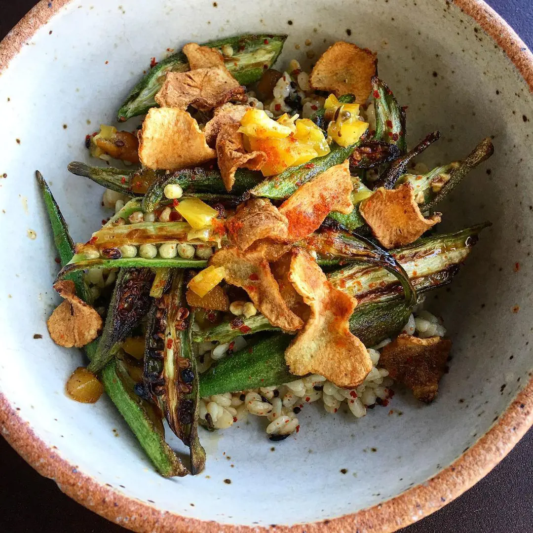 Pan fried okra can be paired with dried chips and spiced gram lentils