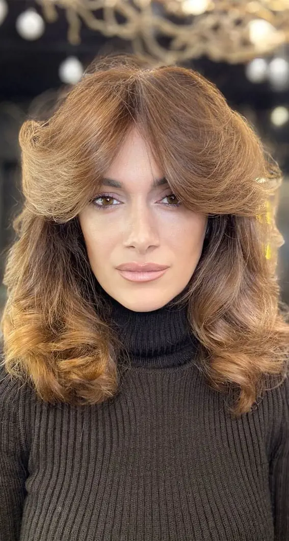 Butterfly haircut was popular during 70s and 80s.