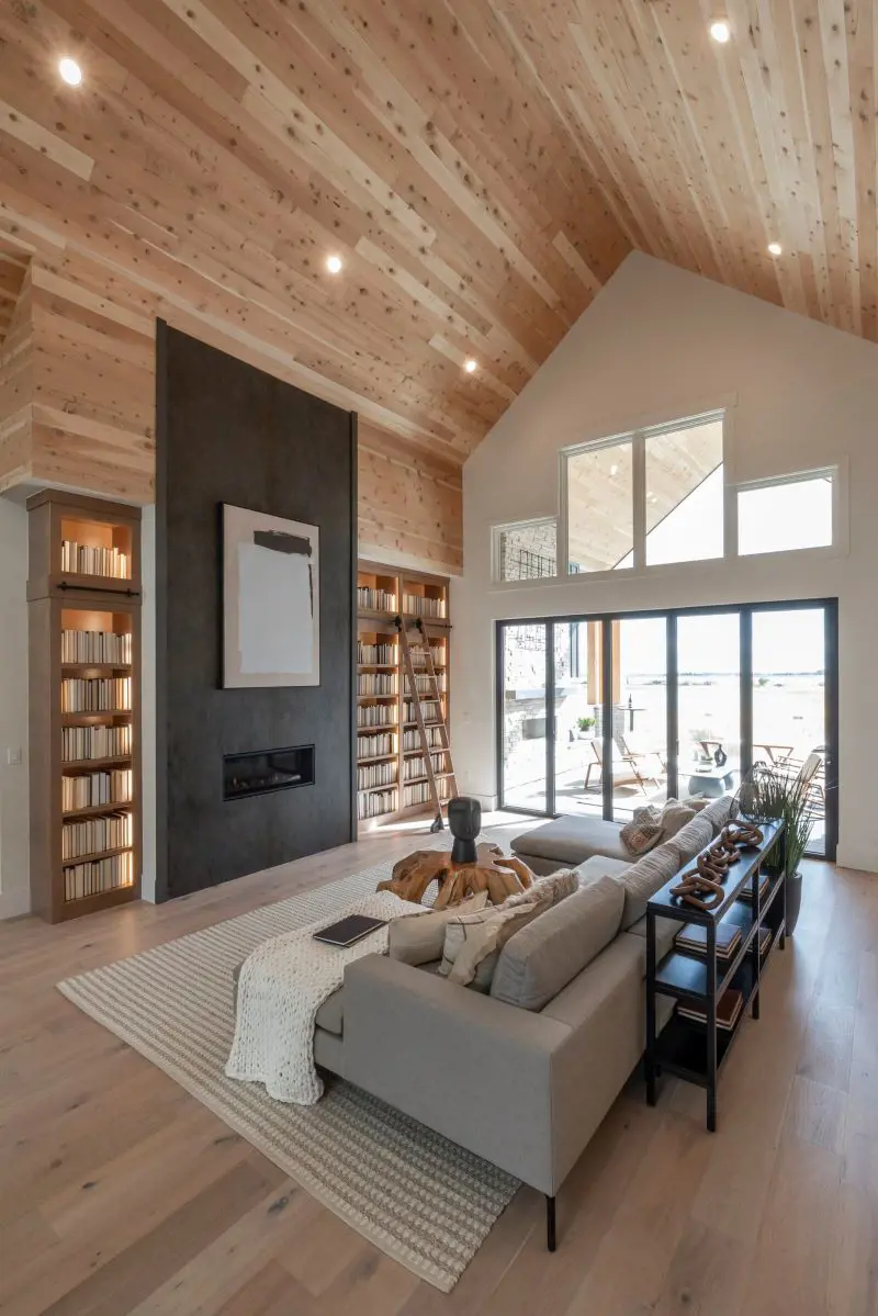 The pair completed the task of renovating their living room with indoor library, cozy fireplace, and half-bathroom 