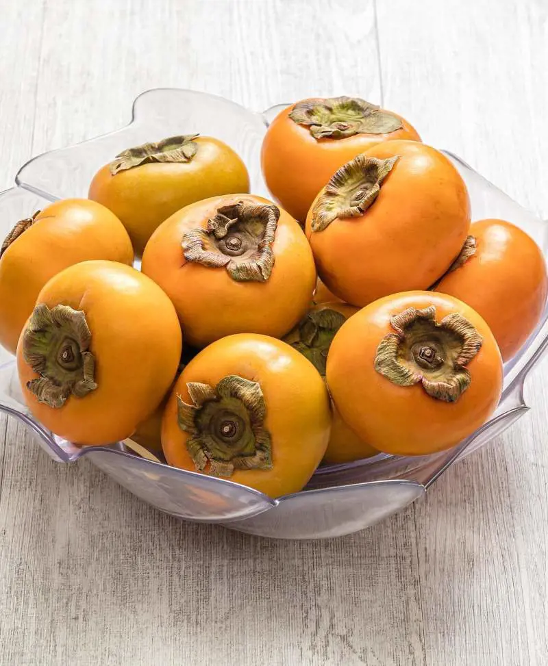Persimmons are versatile, sweet fruits packed with vitamins, minerals, fiber, and beneficial plant compounds