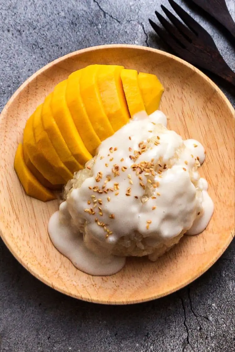 This perfect dessert in summer Mango Sticky rice is similar to rice pudding which contain coconut milk and cinnamon
