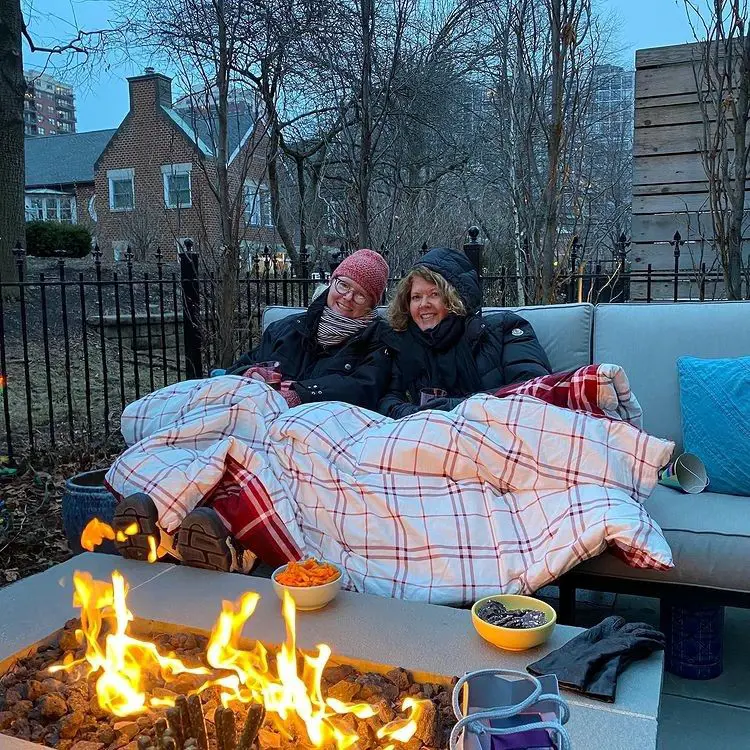 Pam (left) having a cozy time winter time with one of her family members, Ash