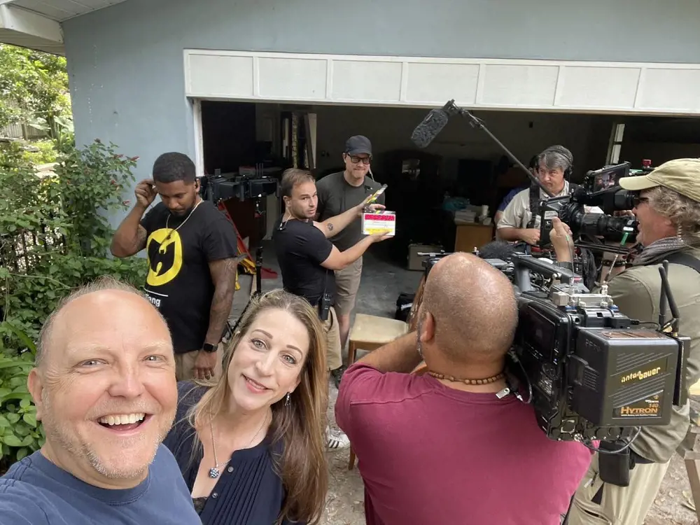 Keith Ori( left) with Cordray and the crew members during a shoot of the Flipping show.