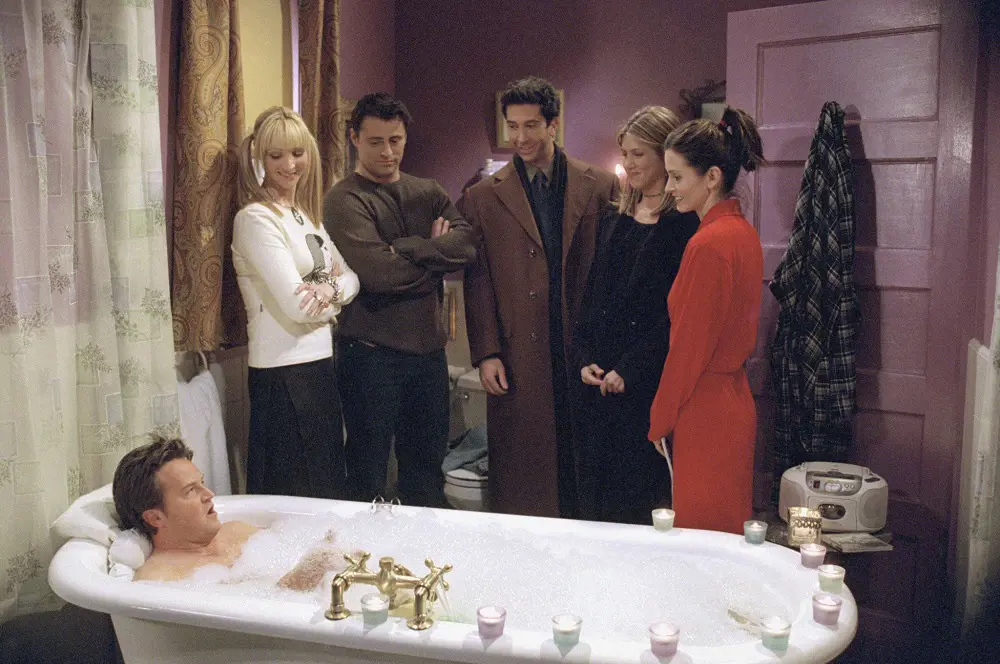 Chandler's friends watch him take a bath